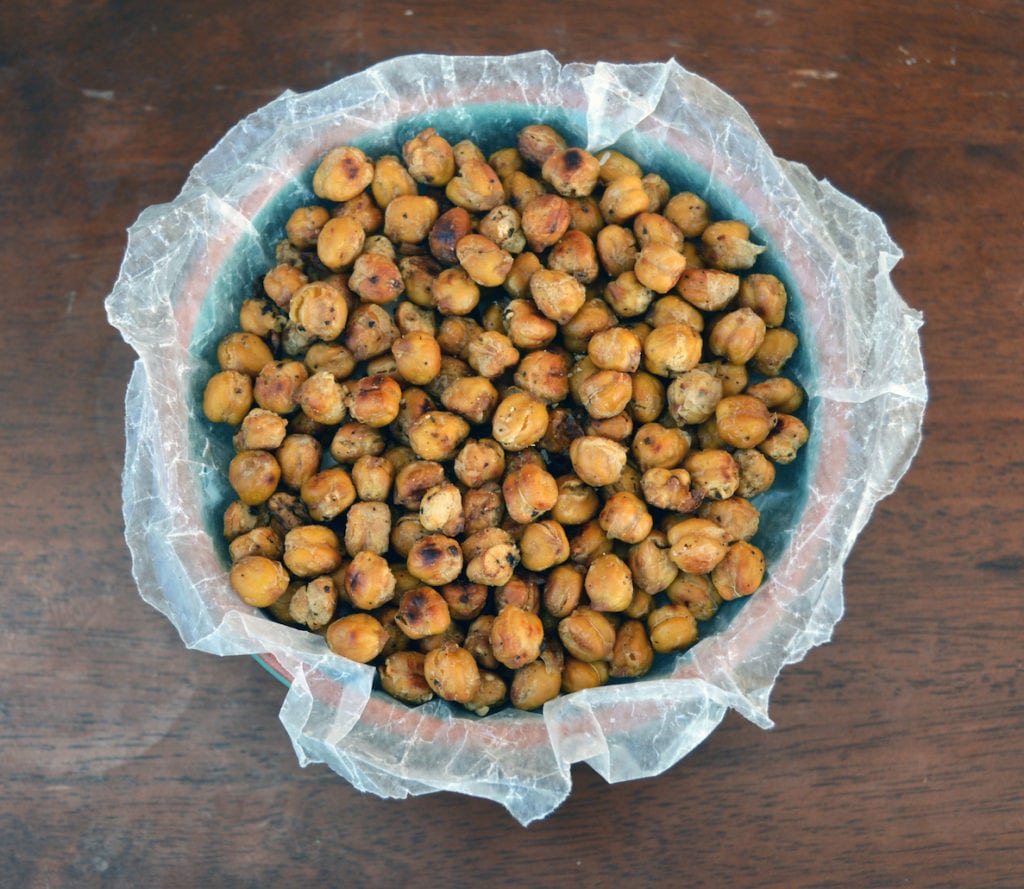 crunchy roasted chickpeas in a green bowl
