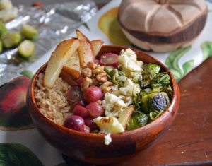 brown rice bowl with brussels sprouts, cauliflower, roasted grapes and roasted pears