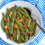 Recipe for Parmesan Roasted Snap Peas. Delicious spring side that comes together in minutes. #sidedish #protein #springrecipe #snappeas #cheesy #parmesan #healthy #lowcalorie