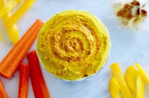 Recipe for Roasted Garlic and Turmeric Hummus. #vegan #healthyside #protein #appetizer #hummus #turmeric #antiinflammatory