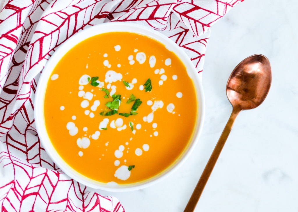4-ingredient vegan butternut squash soup with coconut milk in a white bowl