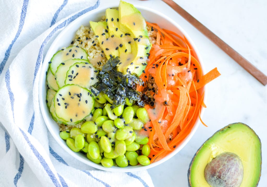 Vegan Sushi Bowl Recipe with carrots, cucumber, edamame, avocado, seaweed, sesame seeds & Miso Dressing