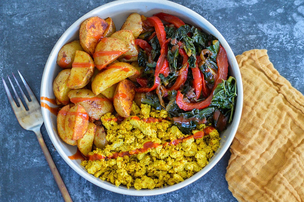 bowl with scrambled tofu, kale and roasted potatoes