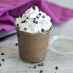 chocolate chia pudding with whipped cream and chocolate chips